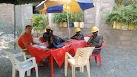 Mr. Jean Louis with local miners in Mirerani, Tanzania