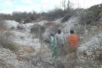 Examining the rocks on Mirerani Hills, Tanzania